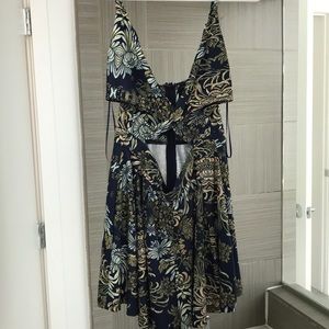 Boutique cute romper criss cross cut out